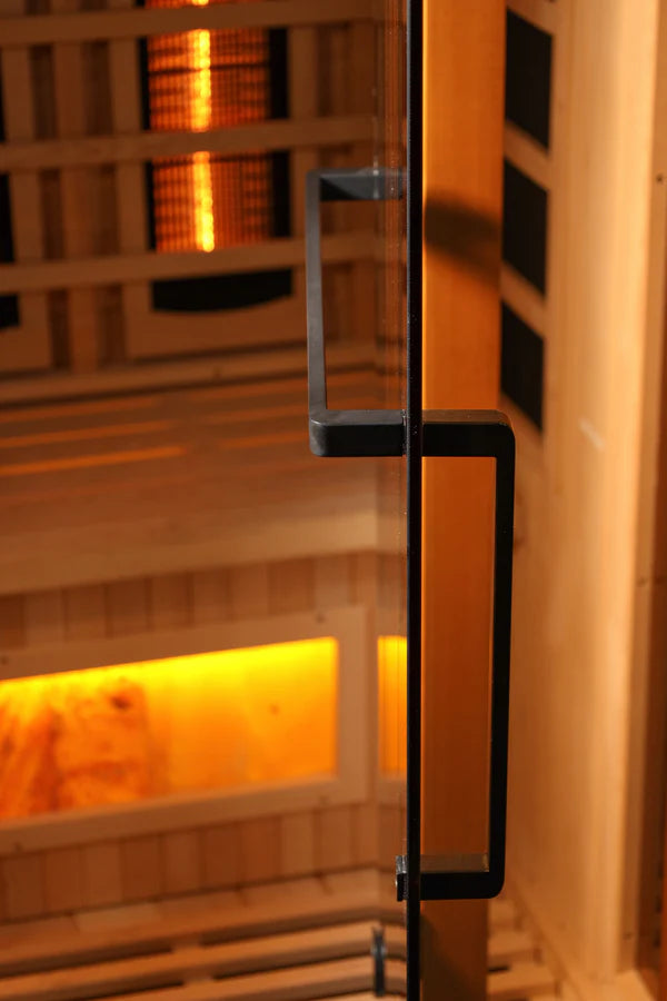 Side view of the glass door from Respite Sauna